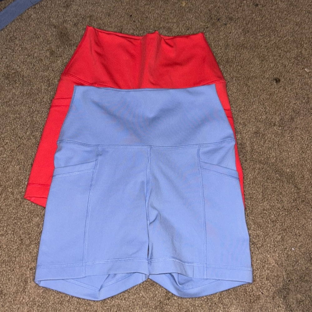 Pink and blue athletic shorts (pockets)